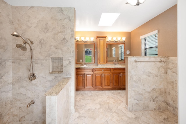 2413 NW 26th St, Boca Raton, FL 33431 - full bath featuring a skylight, walk in shower, double vanity, and tile walls