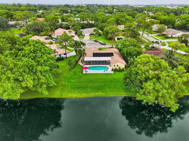 2413 NW 26th St, Boca Raton, FL 33431 - aerial view of residential area with a large body of water, a pool area, and a tree filled landscape