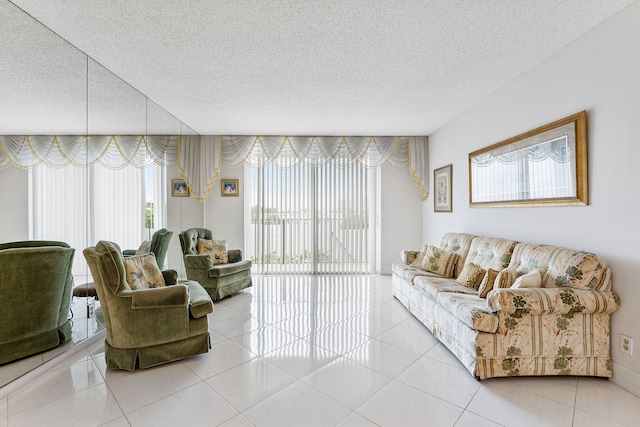 1009 N Ocean Blvd Unit 511, Pompano Beach, FL 33062 - tiled living room with a textured ceiling