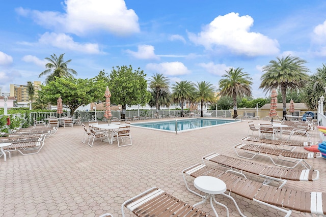1009 N Ocean Blvd Unit 511, Pompano Beach, FL 33062 - community pool featuring a patio