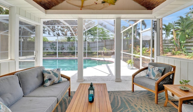 2633 SE Export Ave, Port Saint Lucie, FL 34952 - sunroom featuring outdoor lounge area, a ceiling fan, and vaulted ceiling
