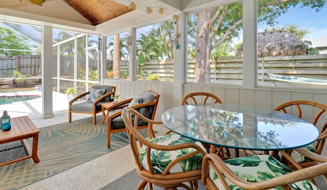 2633 SE Export Ave, Port Saint Lucie, FL 34952 - sunroom / solarium with outdoor dining space, healthy amount of natural light, and lofted ceiling