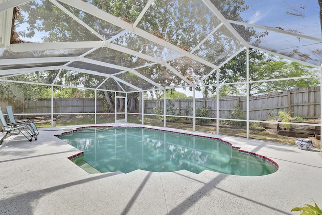 2633 SE Export Ave, Port Saint Lucie, FL 34952 - view of pool with a patio area, a fenced backyard, and a lanai