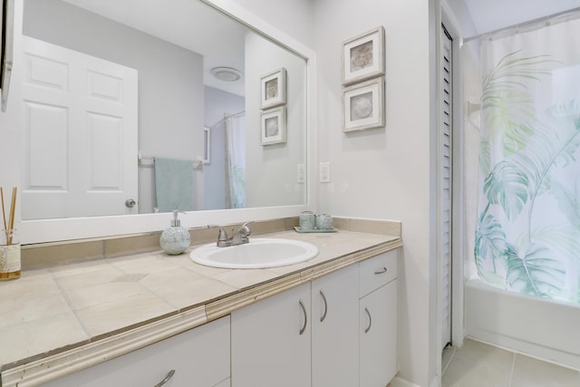 2633 SE Export Ave, Port Saint Lucie, FL 34952 - full bath featuring vanity, tile patterned floors, and shower / bath combo with shower curtain