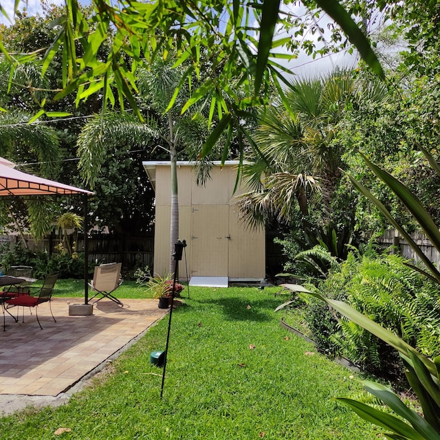 127 SW 12th Ave, Boynton Beach, FL 33435 - view of yard with a patio