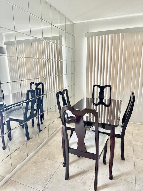 187 Preston E, Boca Raton, FL 33434 - dining area featuring light tile patterned flooring