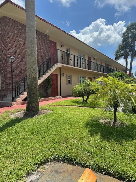 1947 SW Palm City Rd Unit G, Stuart, FL 34994 - view of property with stairs