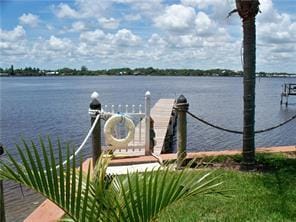 1947 SW Palm City Rd Unit G, Stuart, FL 34994 - dock featuring a water view