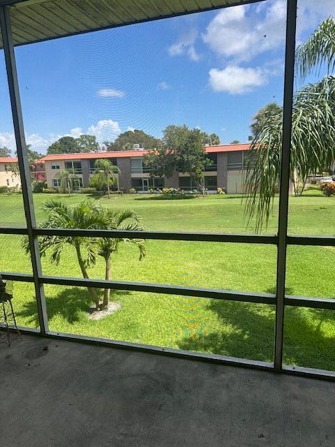 1947 SW Palm City Rd Unit G, Stuart, FL 34994 - view of green lawn