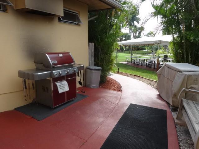 1947 SW Palm City Rd Unit G, Stuart, FL 34994 - view of patio with grilling area