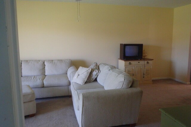 1947 SW Palm City Rd Unit G, Stuart, FL 34994 - living area with light carpet and baseboards