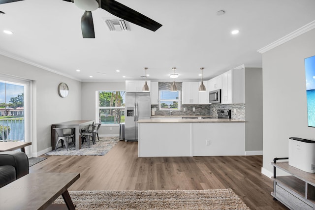 388 Tuscany G 388, Delray Beach, FL 33446 - living room featuring ornamental molding, baseboards, ceiling fan, wood finished floors, and recessed lighting