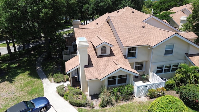 8111 Northboro Ct Unit 11B, Lake Clarke Shores, FL 33406 - rear view of house with roof with shingles, a balcony, and a chimney