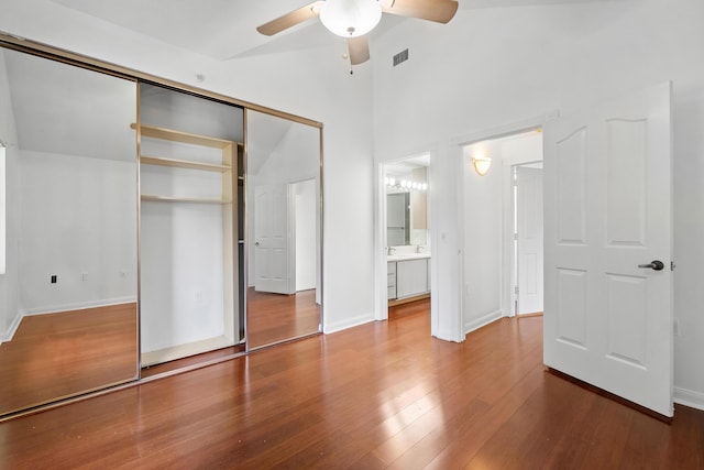 8111 Northboro Ct Unit 11B, Lake Clarke Shores, FL 33406 - unfurnished bedroom with wood finished floors, a closet, baseboards, and a ceiling fan