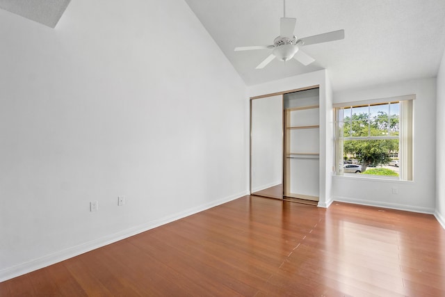 8111 Northboro Ct Unit 11B, Lake Clarke Shores, FL 33406 - unfurnished bedroom featuring lofted ceiling, wood finished floors, baseboards, a closet, and ceiling fan