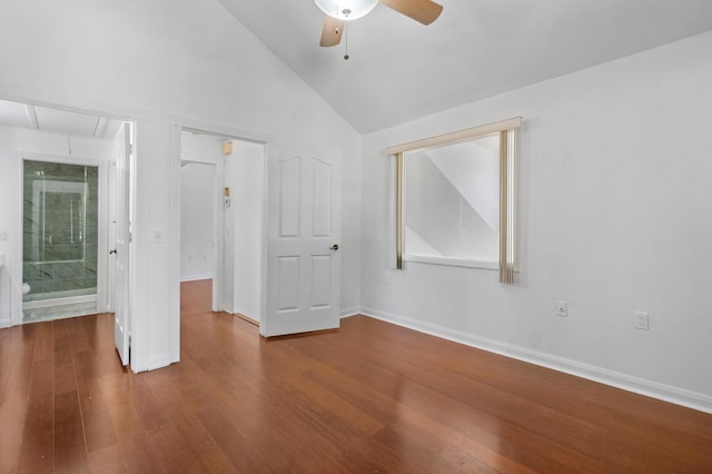 8111 Northboro Ct Unit 11B, Lake Clarke Shores, FL 33406 - unfurnished bedroom featuring attic access, lofted ceiling, wood finished floors, baseboards, and a ceiling fan