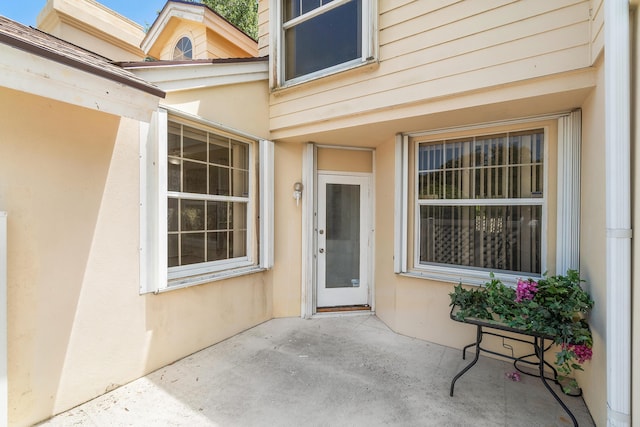 8111 Northboro Ct Unit 11B, Lake Clarke Shores, FL 33406 - property entrance with a patio area and stucco siding
