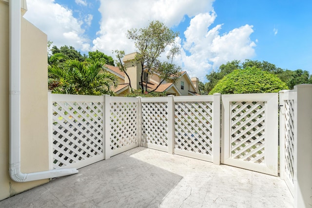 8111 Northboro Ct Unit 11B, Lake Clarke Shores, FL 33406 - view of patio / terrace with a gate
