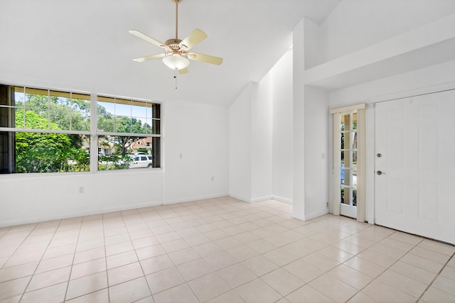 8111 Northboro Ct Unit 11B, Lake Clarke Shores, FL 33406 - entrance foyer featuring plenty of natural light, ceiling fan, baseboards, high vaulted ceiling, and light tile patterned floors