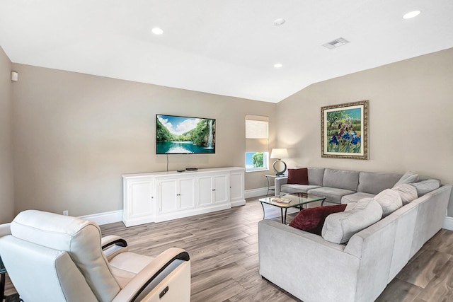 21480 Halstead Dr, Boca Raton, FL 33428 - living area with light wood finished floors, recessed lighting, and lofted ceiling