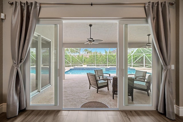 21480 Halstead Dr, Boca Raton, FL 33428 - entryway with a ceiling fan, wood finished floors, and a sunroom
