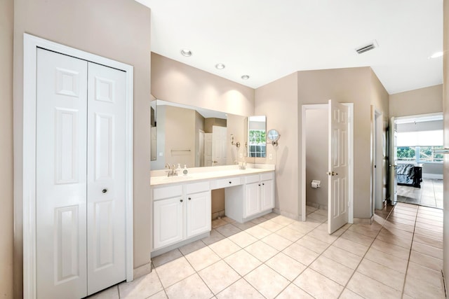 21480 Halstead Dr, Boca Raton, FL 33428 - ensuite bathroom with double vanity, a closet, and tile patterned floors