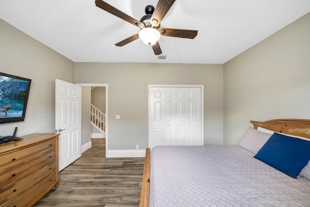 21480 Halstead Dr, Boca Raton, FL 33428 - unfurnished bedroom with wood finished floors, a closet, and a ceiling fan