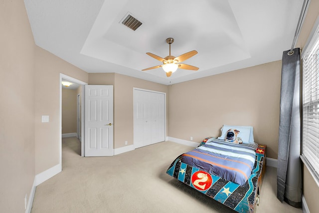 21480 Halstead Dr, Boca Raton, FL 33428 - carpeted bedroom with a tray ceiling and a ceiling fan