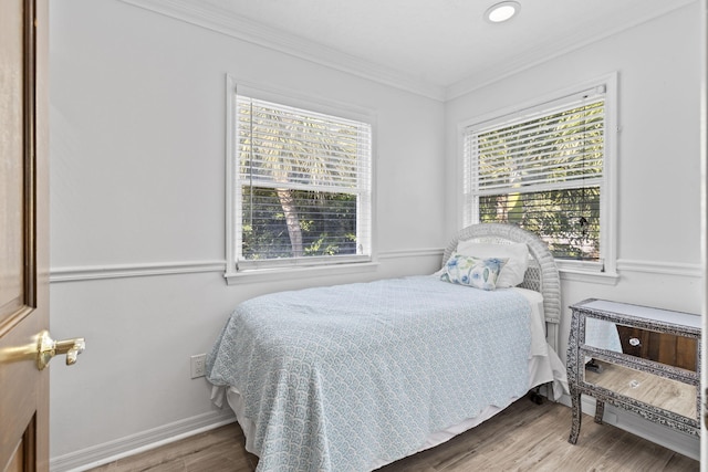 2070 Spring Pl, Vero Beach, FL 32963 - bedroom with wood finished floors, crown molding, baseboards, and recessed lighting