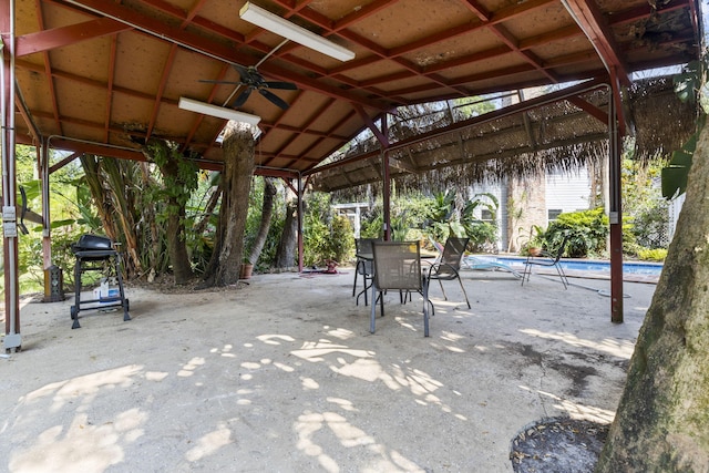 2070 Spring Pl, Vero Beach, FL 32963 - view of patio featuring an outdoor pool, a ceiling fan, and grilling area