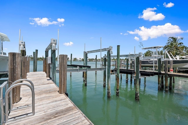 1579 Bow Line Rd, Fort Pierce, FL 34949 - dock area with boat lift and a water view