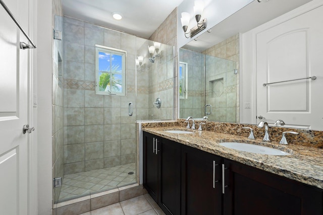 1579 Bow Line Rd, Fort Pierce, FL 34949 - full bathroom with double vanity, a stall shower, and tile patterned floors