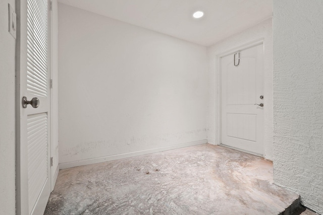 1579 Bow Line Rd, Fort Pierce, FL 34949 - empty room with concrete flooring and baseboards