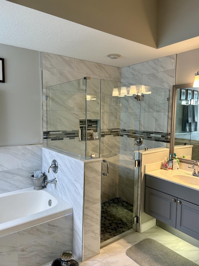 644 NW San Candido Way, Port Saint Lucie, FL 34986 - full bathroom with a garden tub, vanity, a stall shower, and marble finish floors