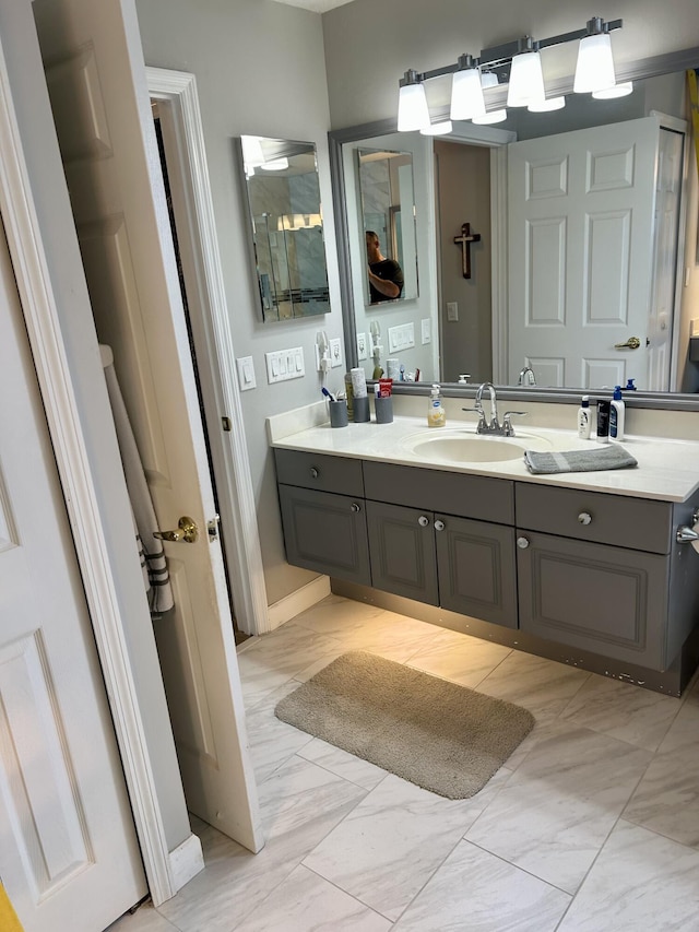 644 NW San Candido Way, Port Saint Lucie, FL 34986 - bathroom with marble finish floors and vanity