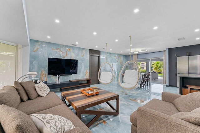 1772 SW Commodore Pl, Palm City, FL 34990 - living area featuring marble tiled floors and recessed lighting