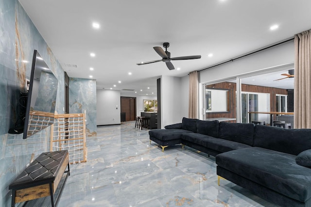 1772 SW Commodore Pl, Palm City, FL 34990 - living area featuring a ceiling fan, marble tiled floors, and recessed lighting