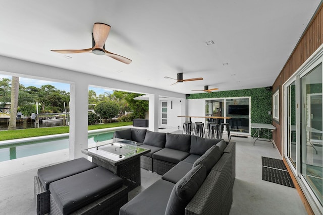 1772 SW Commodore Pl, Palm City, FL 34990 - view of patio / terrace with a ceiling fan, an outdoor living space, and an outdoor pool