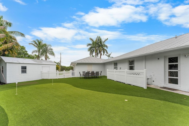 1772 SW Commodore Pl, Palm City, FL 34990 - view of yard with a putting green