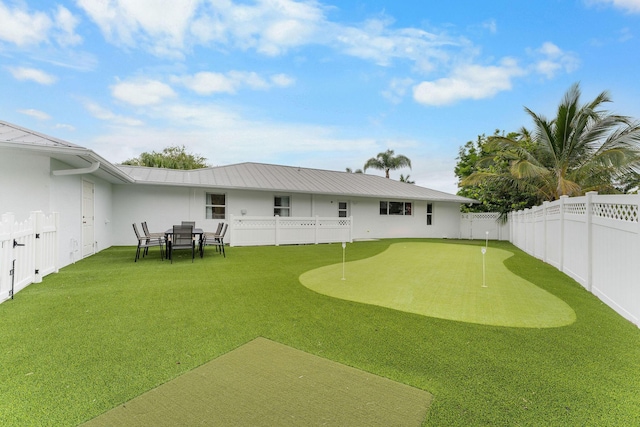 1772 SW Commodore Pl, Palm City, FL 34990 - fenced backyard featuring a putting area