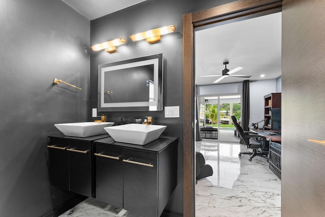 1772 SW Commodore Pl, Palm City, FL 34990 - bathroom with marble finish floors, double vanity, and a ceiling fan