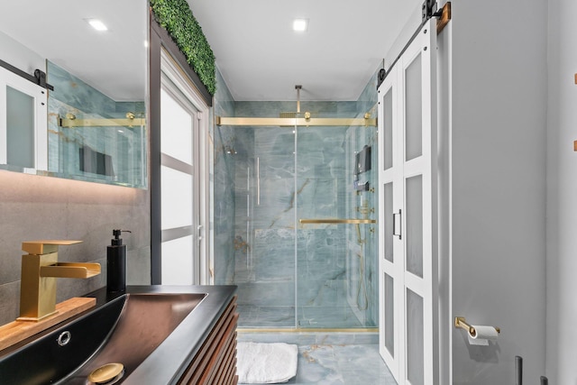 1772 SW Commodore Pl, Palm City, FL 34990 - full bathroom with a marble finish shower, vanity, and marble finish floors