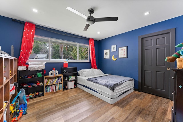 1772 SW Commodore Pl, Palm City, FL 34990 - bedroom featuring wood finished floors, ceiling fan, and recessed lighting