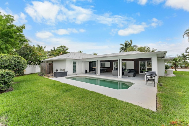 1772 SW Commodore Pl, Palm City, FL 34990 - back of house with outdoor lounge area, a patio area, an outdoor pool, stucco siding, and metal roof