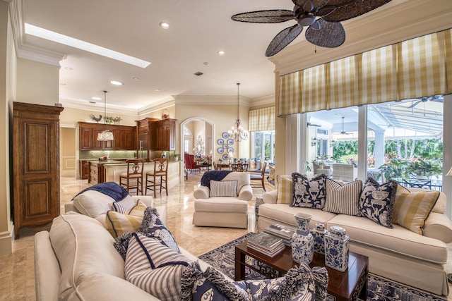 7656 Steeplechase Dr, Palm Beach Gardens, FL 33418 - living room with a ceiling fan, crown molding, recessed lighting, and a chandelier