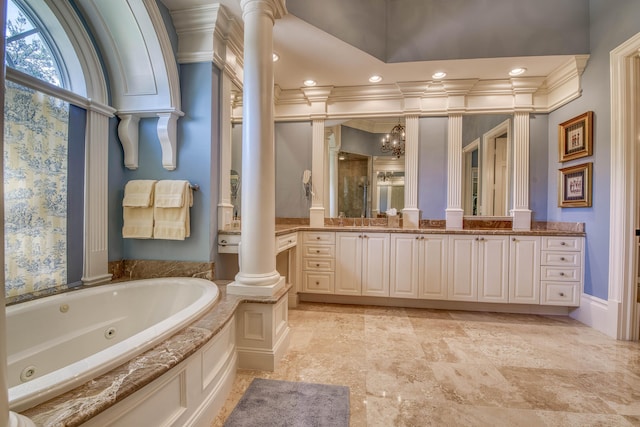 7656 Steeplechase Dr, Palm Beach Gardens, FL 33418 - bathroom featuring ornate columns, vanity, a tub with jets, ornamental molding, and recessed lighting