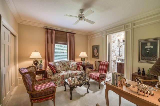 7656 Steeplechase Dr, Palm Beach Gardens, FL 33418 - living area with carpet, crown molding, ceiling fan, and a textured ceiling
