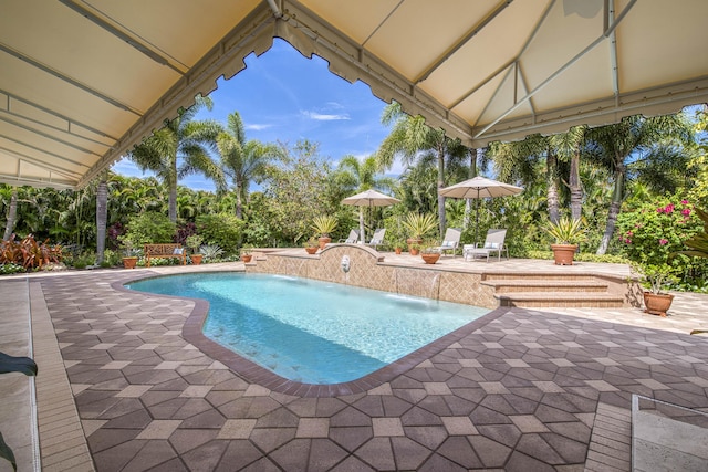 7656 Steeplechase Dr, Palm Beach Gardens, FL 33418 - outdoor pool featuring a patio