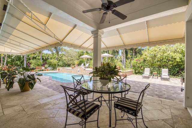 7656 Steeplechase Dr, Palm Beach Gardens, FL 33418 - view of patio with ceiling fan, an outdoor pool, and outdoor dining space