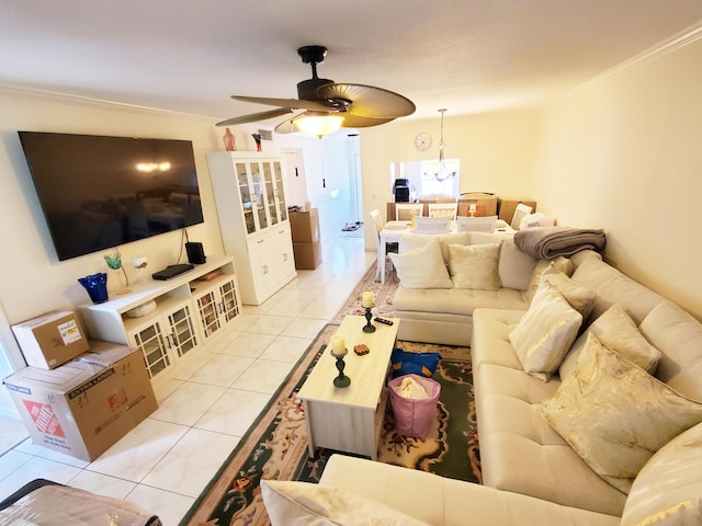 708 Laconia Cir Unit 708, Lake Worth, FL 33467 - living area featuring a ceiling fan, crown molding, light tile patterned floors, and a chandelier